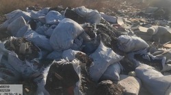 В Наримановском районе ликвидировали свалку из шин и картона
